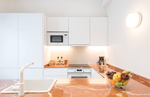 El Guinardo Apartment | Exceptional Mediterranean Home with 4 Bedrooms & Spa Access