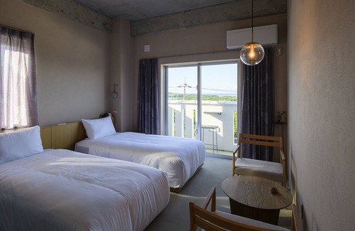 Taketomi-jima Taketomi-cho Hotel | Explore Meguru Ishigaki: Eco-Friendly Family Retreat