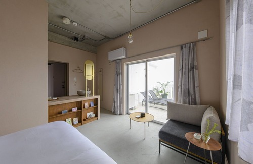 Taketomi-jima Taketomi-cho Hotel | Explore Meguru Ishigaki: Eco-Friendly Family Retreat
