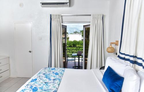St. Lawrence Gap House | Discover Melbourne Inn: Oceanfront Escape with Pool Access