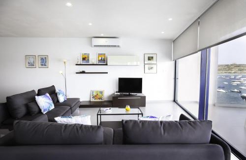Għadira Apartment | Exceptional Mellieha Bay Waters Edge with Oceanfront Views