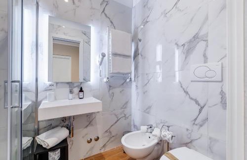 Prati House | Elegant Mellini Palace Suites with Hot Tub & Family Appeal