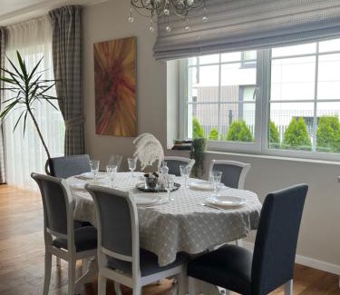 Klaipeda Villa | Cozy Melnrage Beach Apartments with Ocean Views & Terrace