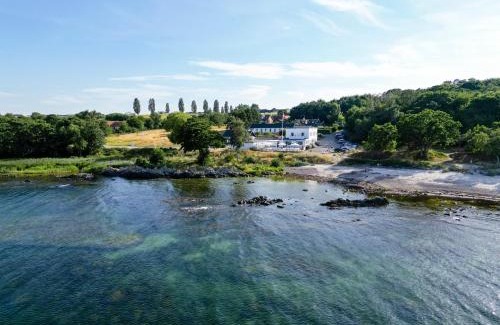 Gudhjem Hotel | Oceanfront Bliss at Melsted Badehotel - Rated 9/10