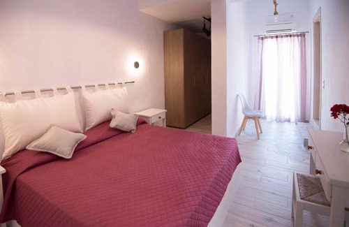 Chrissi Akti Apartment | Meltemi 1: Exceptional Oceanfront Escape with Private Beach