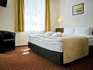 Old Town Hotel | Explore Memel Hotel: Pet-Friendly with High Guest Ratings
