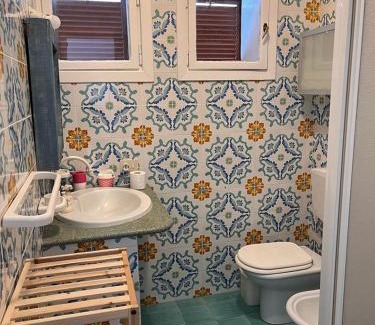 Vulcano Porto Apartment | Rosetta Bilo: Relax by the Pool in Family-Friendly Retreat