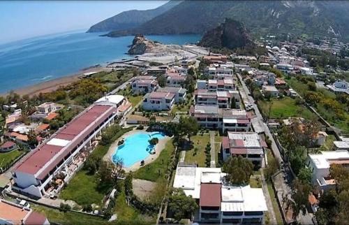 Vulcano Porto Apartment | Rosetta Bilo: Relax by the Pool in Family-Friendly Retreat