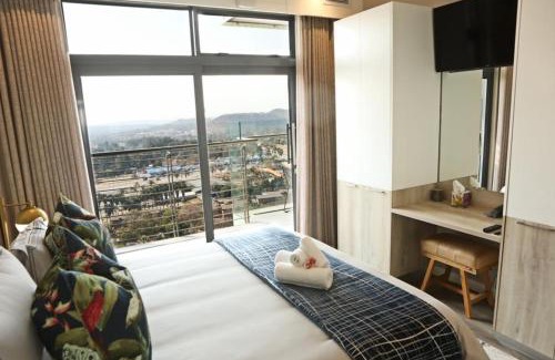 Menlyn Apartment | Menlyn Trilogy: 2 Bedrooms with Scenic Views & Pool Access