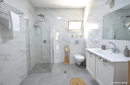 Migdal Apartment | Oceanfront MeravSuite with Pool and Breakfast Included