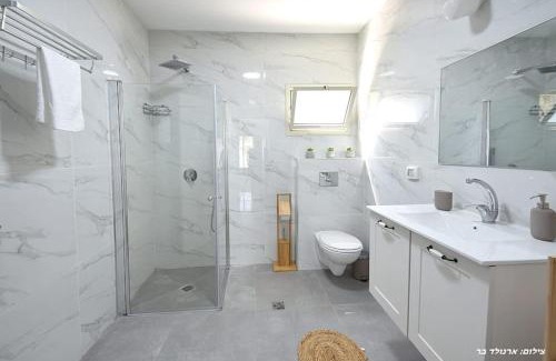 Migdal Apartment | Oceanfront MeravSuite with Pool and Breakfast Included