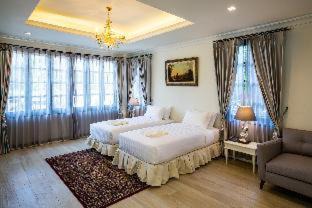Chang Phueak Hotel | Merchant Villa: 4-Star Haven with Pool & Hot Tub Access