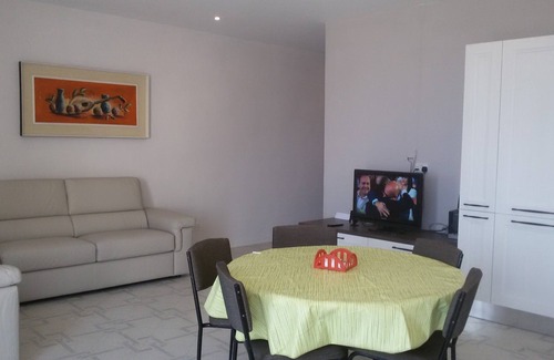Marsalforn Apartment | Beachfront Corner Apartment with Family-Friendly Amenities