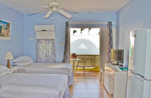 St. Lawrence Gap House | Ocean View Meridian Inn: Family-Friendly with Hot Tub Access