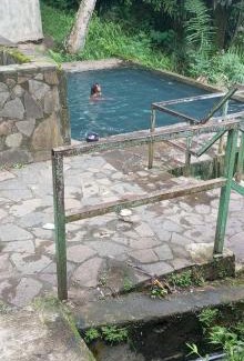 Moni House | Discover Family-Friendly Comfort at Merids with Hot Tub