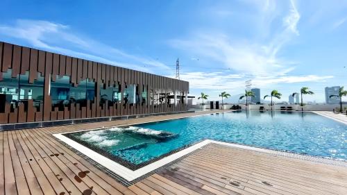 Central Seberang Perai Apartment | Experience Meritus Residensi Penang: Oceanfront Pool Oasis
