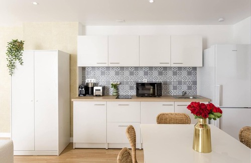 8th Arrondissement Apartment | Champs Elysées: Cozy 4 Bedroom Apartment with Spa Access