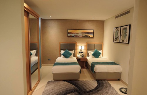 Al Hoora Hotel | Relax at Meshal Hotel & Spa: 4-Star Comfort with Pool