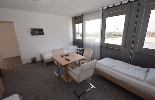 Wolfschlugen House | Discover Messezimmer AB Apartments: Child-Friendly Comfort