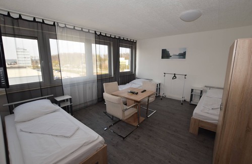 Wolfschlugen House | Discover Messezimmer AB Apartments: Child-Friendly Comfort