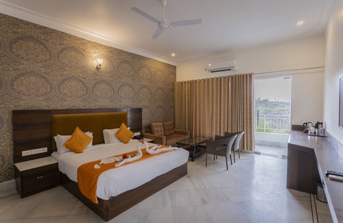Udaipur District Resort | Discover Mewar Palace Resort: Pool, Restaurant & More