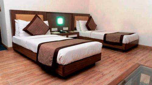 Tirora Hotel | Budget-Friendly Mg Regency with Family Amenities & Dining