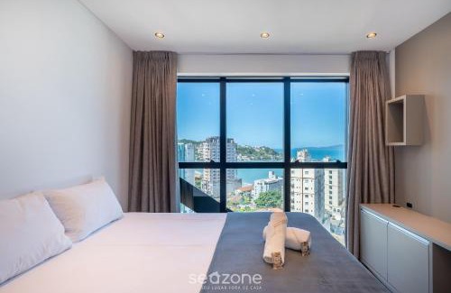 Centro Apartment | Ocean View Studios at MHFA: Poolside Family Retreat