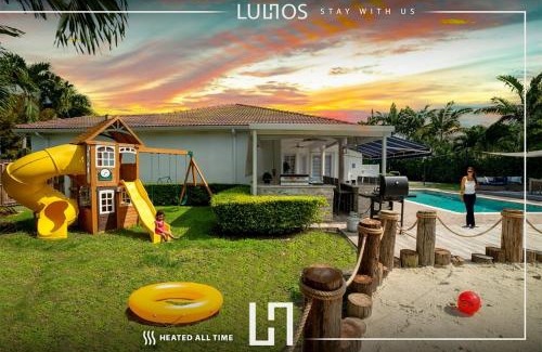 Ludlam House | Inviting Home with Heated Pool & Basketball Court