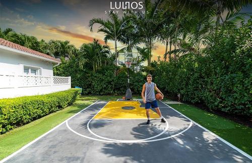 Ludlam House | Inviting Home with Heated Pool & Basketball Court