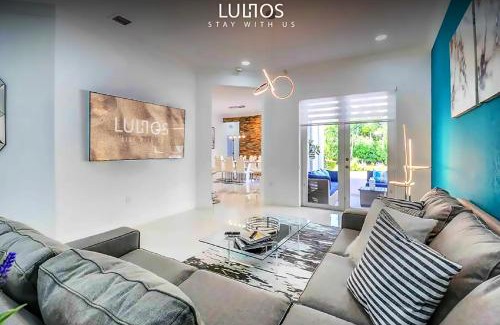 Ludlam House | Inviting Home with Heated Pool & Basketball Court