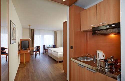 Niedernhausen Apartment | Pet-Friendly Micador Appartementhaus with Hot Tub & Dining