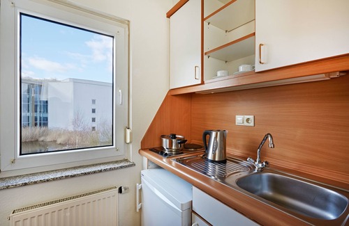 Niedernhausen Apartment | Pet-Friendly Micador Appartementhaus with Pool & Restaurant