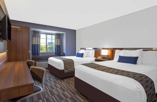 New Castle Hotel | Inviting Microtel Inn & Suites in Gardendale with Pool