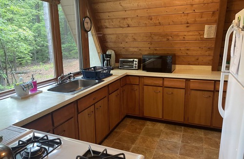 Center Harbor House | Stylish Mid-Century A-frame with Lake and Ocean Views
