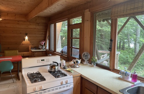 Center Harbor House | Stylish Mid-Century A-frame with Lake and Ocean Views