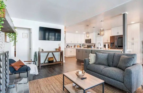 Riverside House | Modern Heated Pool Home with Game Room & Spa Amenities