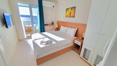 Foca Hotel | Oceanfront Retreat at Midilli Konak Foca for Families