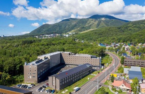 Hirafu Hotel | Discover Midtown Niseko: Family-Friendly & Accessible Stay