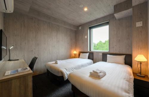 Hirafu Hotel | Discover Midtown Niseko: Family-Friendly & Accessible Stay