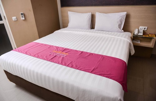 Sampit Hotel | Midtown Xpress Sampit: Family-Friendly Comfort Awaits