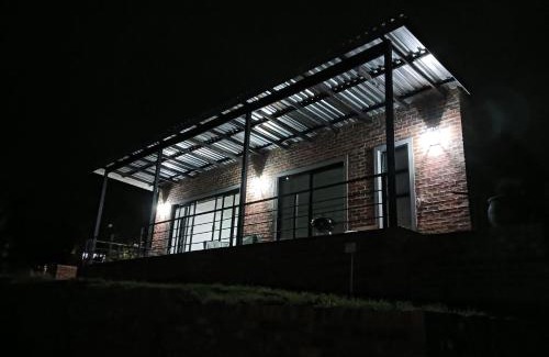 Dullstroom Apartment | Cozy Mika Self Catering Cottage with Inviting Fireplace