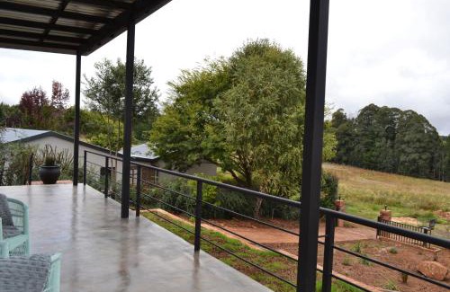 Dullstroom Apartment | Cozy Mika Self Catering Cottage with Inviting Fireplace