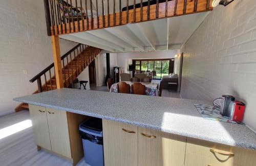 Betty's Bay House | Charming Family Retreat at Milkwood Cottage for Your Getaway