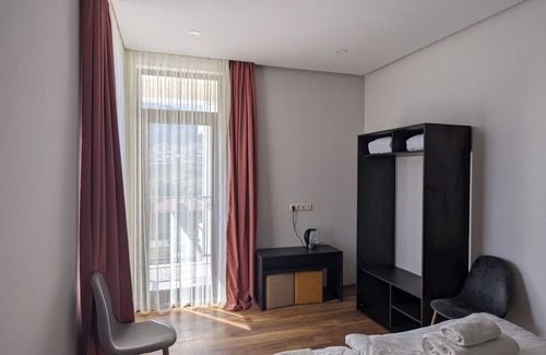 Stepantsminda Hotel | Budget-Friendly Stay at Milky Way with Kitchen & Breakfast