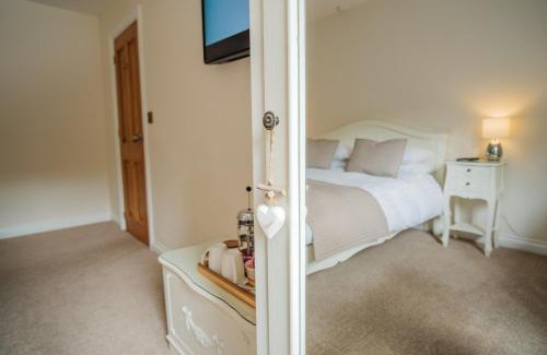 Gilwern Bed & Breakfast | Experience Mill Lodge in Brecon Beacons with Ocean Views