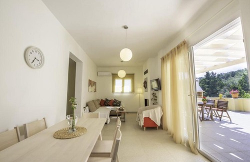 Agios Georgios Pagon Apartment | Seaside Comfort at Miltiadis Apartments - Rated 9/10