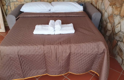 Isola delle Femmine Apartment | Oceanfront Escape at Mimosa House with Family-Friendly Perks