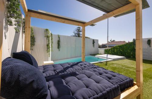 San Agustin House | Relax at Mimosas Suites: Pool, Spa & Family-Friendly Fun