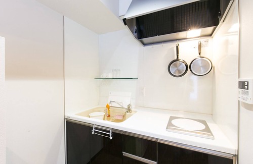 Higashi Ward Apartment | Stylish Mina Aoi Apartment: Family-Friendly with Kitchen