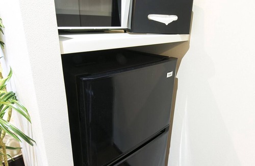 Higashi Ward Apartment | Stylish Mina Aoi Apartment: Family-Friendly with Kitchen